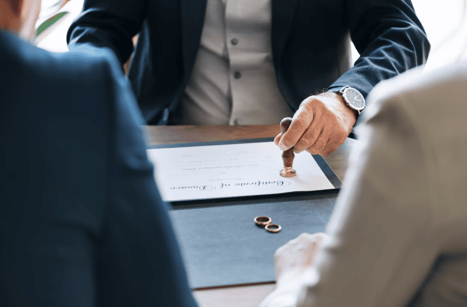 A lawyer stamping a marriage certificate.